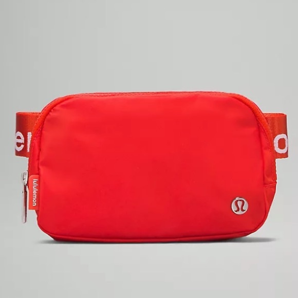 lululemon athletica Handbags - LAST ONE! NWT *sold out online* AUTHENTIC LULULEMON ORANGE WHITE BELT WAIST BAG